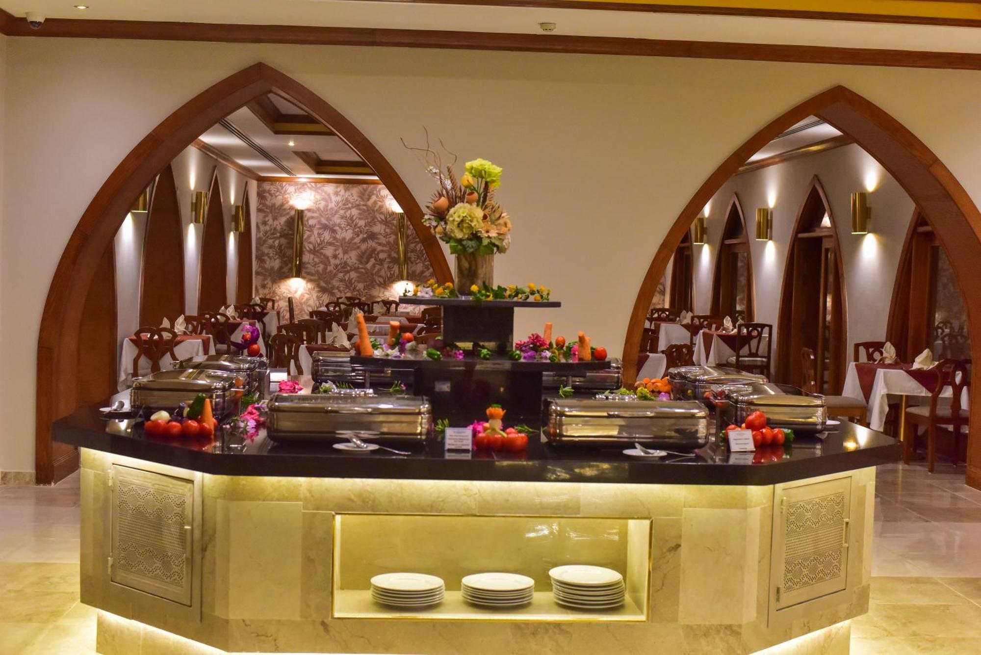The Grand Hotel Sharm El Sheikh Exterior photo A buffet at a hotel